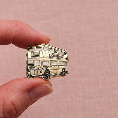 Victoria Eggs Gold Bus Pin Badge