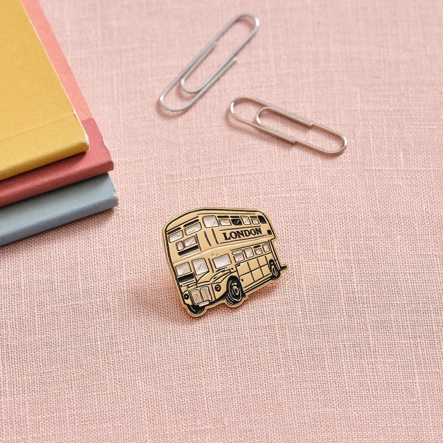Victoria Eggs Gold Bus Pin Badge