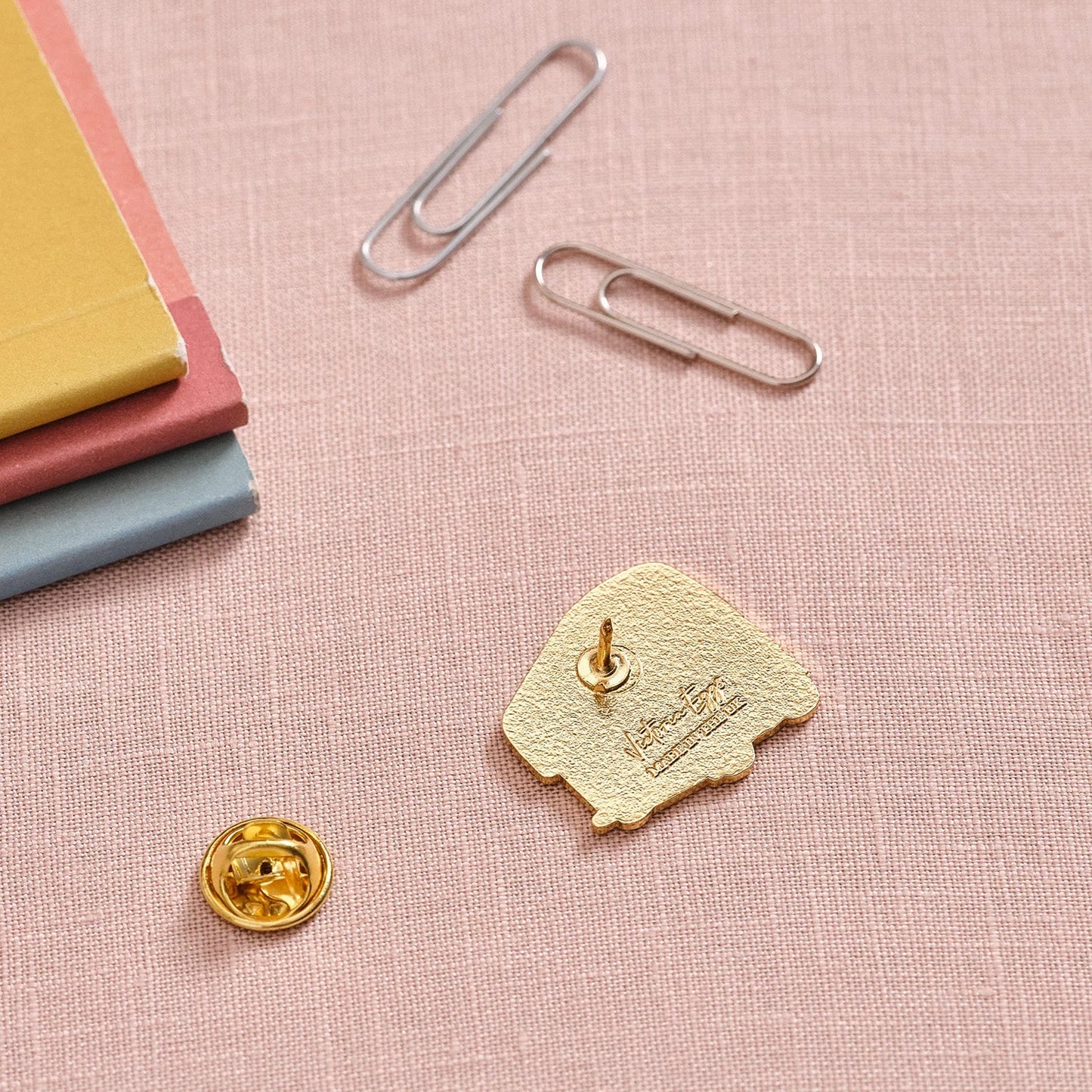 Victoria Eggs Gold Bus Pin Badge