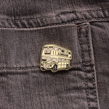 Victoria Eggs Gold Bus Pin Badge